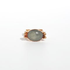 Vintage 18 K Gold Ring with a Cabochon Cut green Stone, Made in 1972