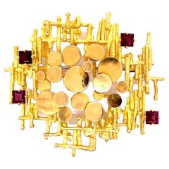 From Lucerne, Switzerland Vintage 18K Yellow Gold and Garnet Contemporary Brooch