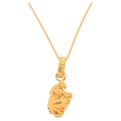 Pendentif en forme de pépite d'or jaune 24 carats brut et massif, 4,95 grammes, d'Australie