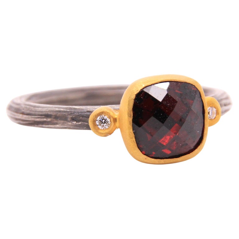 Checkerboard Cut Garnet, Diamonds in 24kt Gold and Silver Ring by Kurtulan Jewellery of Istanbul, Turkey
Garnet meaning: Love and Friendship. With associations with the heart, blood, inner fire, and life force, garnets have long been considered