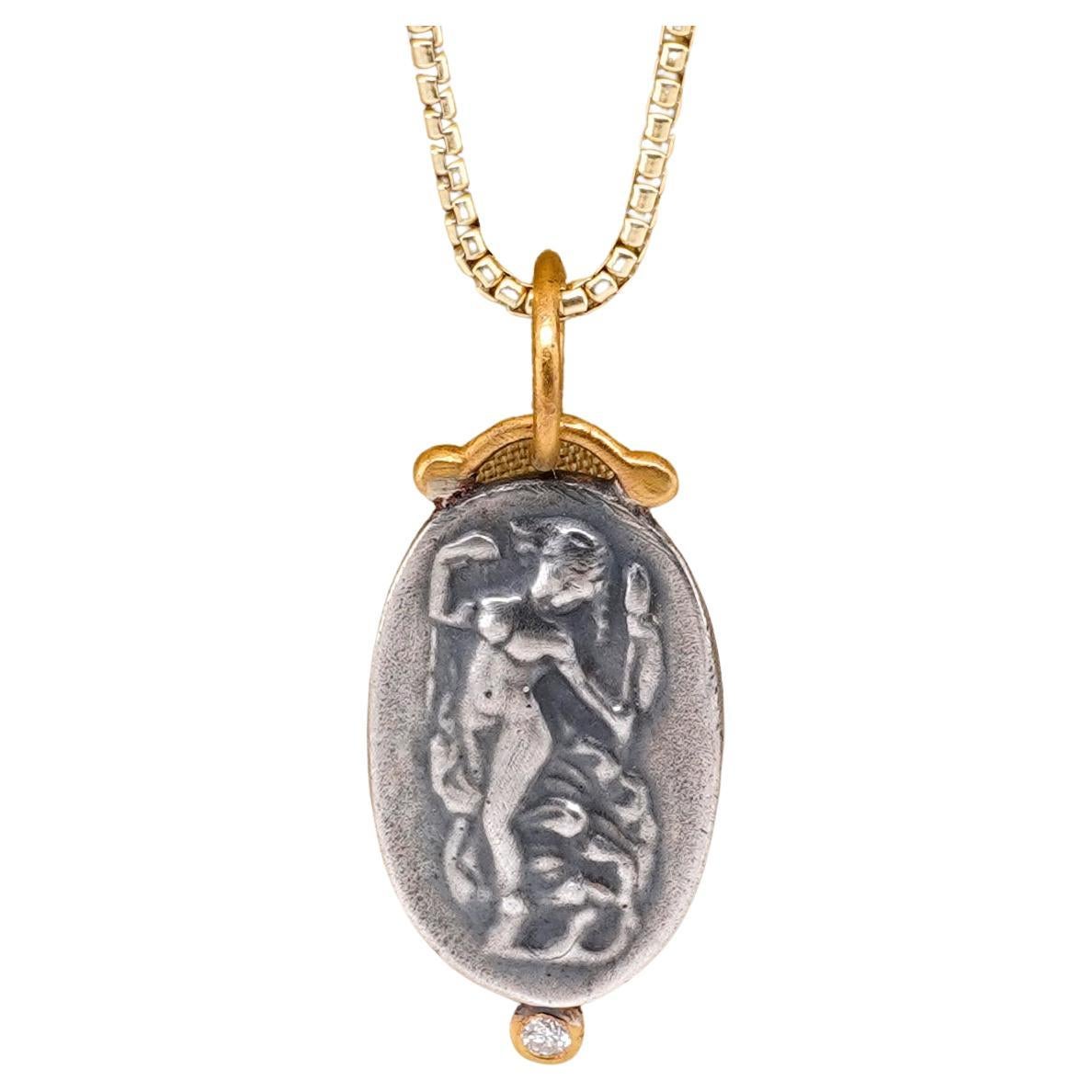 The Joy of Life, Roman Woman Intaglio, Coin Charm Amulet Pendant Necklace with Diamond, 24kt Gold and Silver by Prehistoric Works of Istanbul, Turkey. Diamond - 0.02cts. These coin amulet pendant pair well alone or with other coin pendants or with