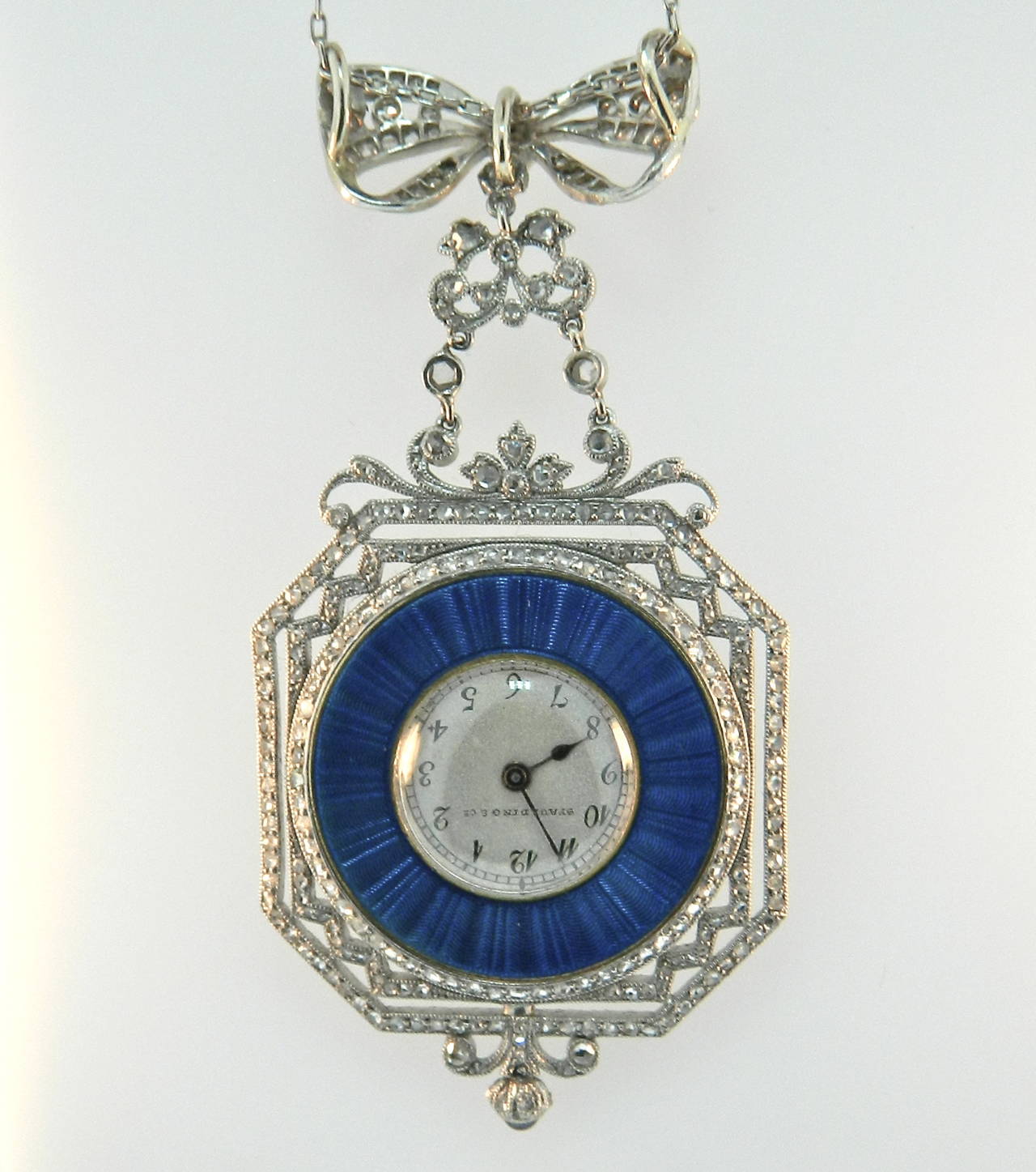 A stunning and unique Edwardian, Diamond, Enamel and Platinum Pendant Watch by Spaulding & Co Chicago.  Made In France.  Movement possibly by Patek Philippe.