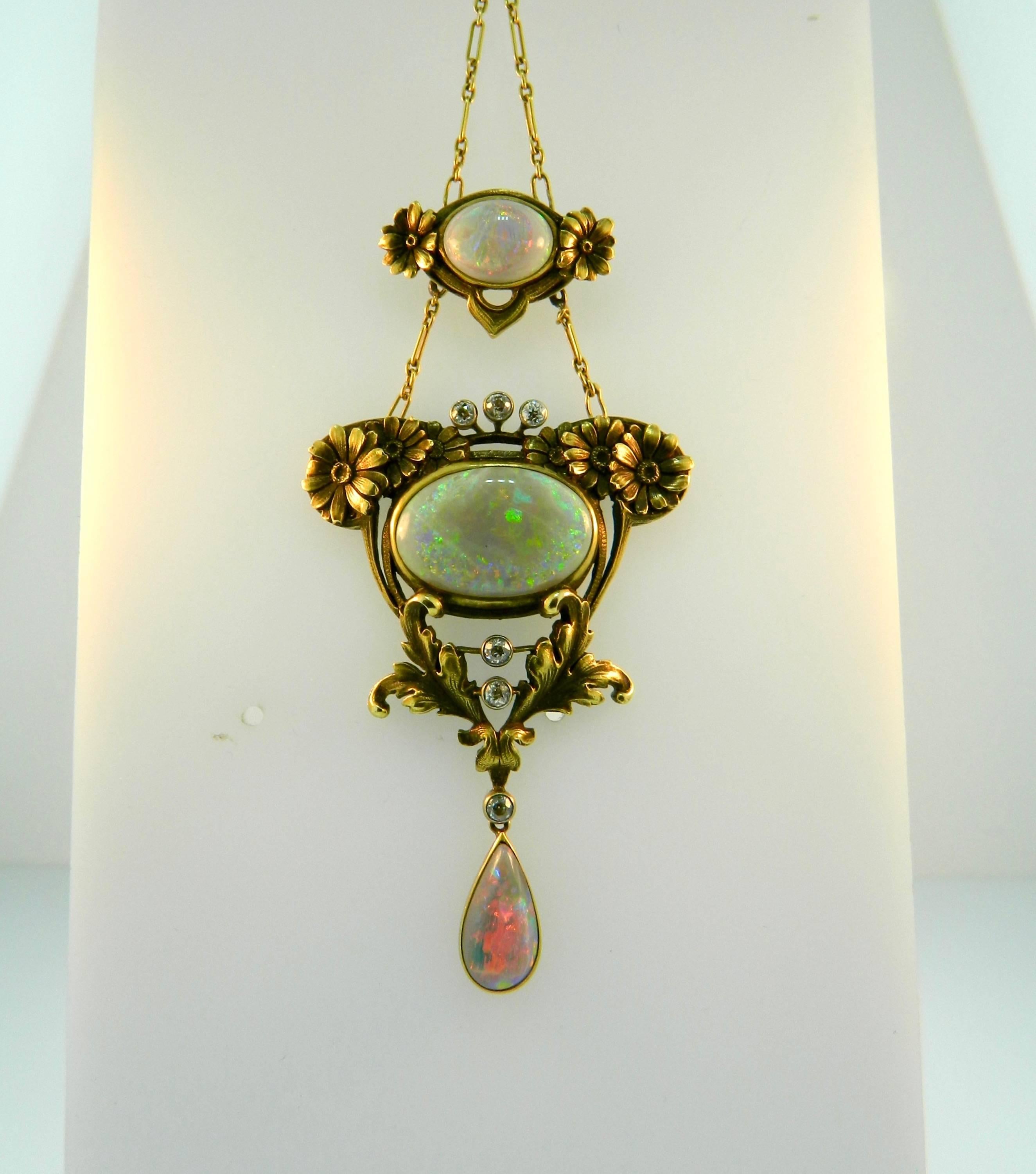 A sweet and rare Art Nouveau gold, diamond and opal Lavaliere Necklace by Kohn & Company.  Circa 1900.