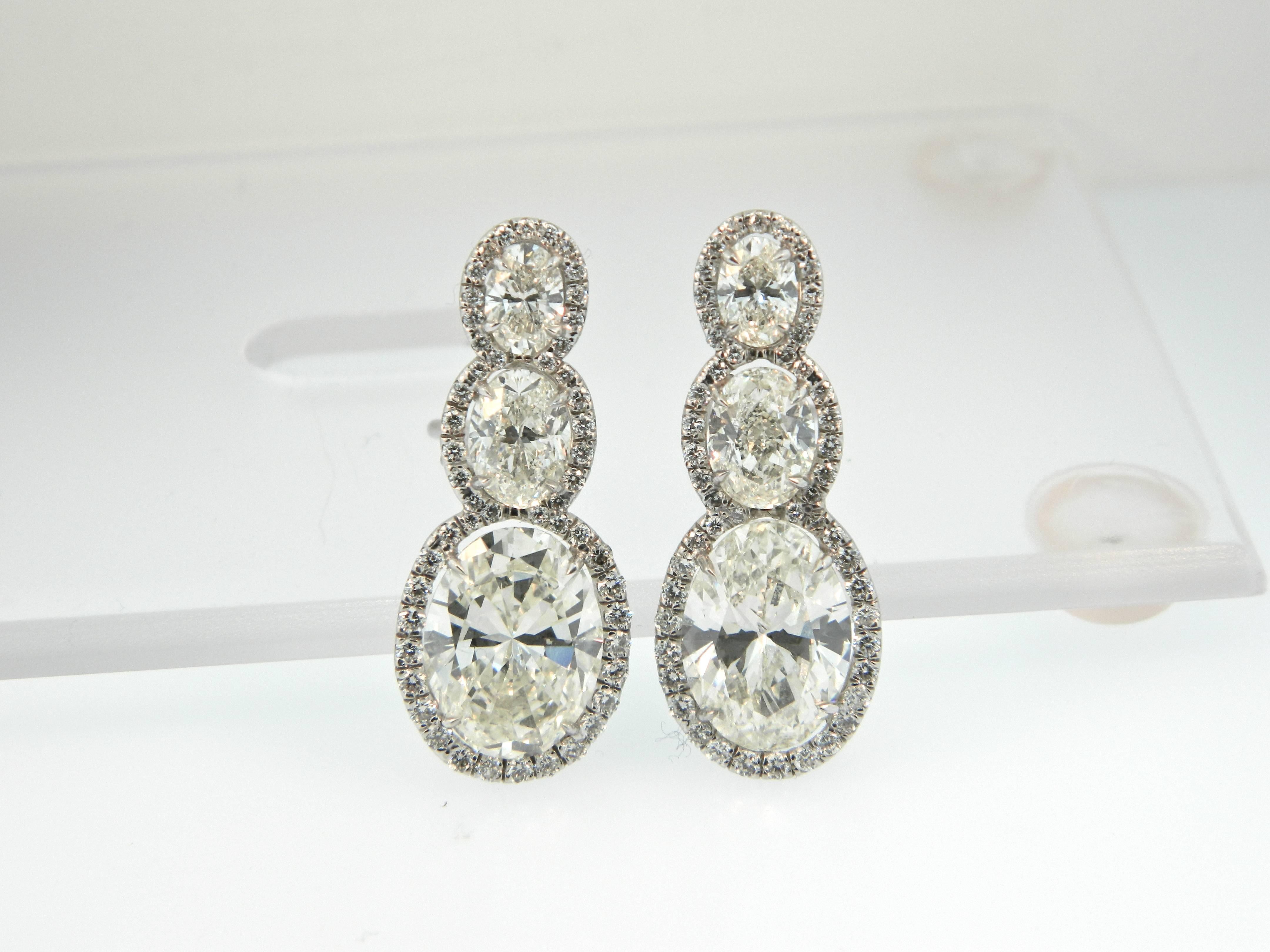 Hartz & Co. GIA Cert Oval Cut Diamond Platinum Halo Earrings In Excellent Condition In Chicago, IL
