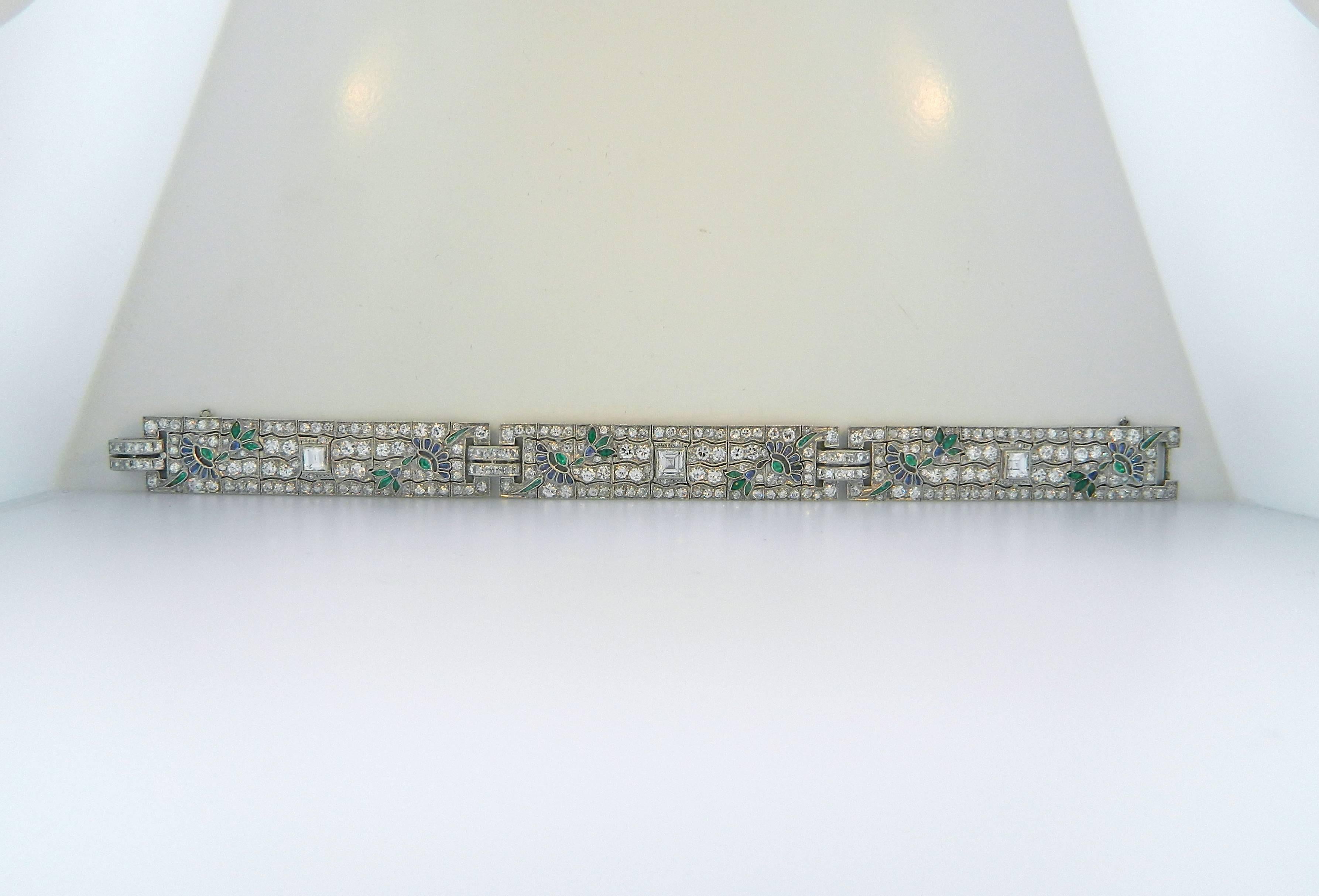 A fabulous 1920s Art Deco Platinum, Diamond, Sapphire and Emerald Bracelet. 