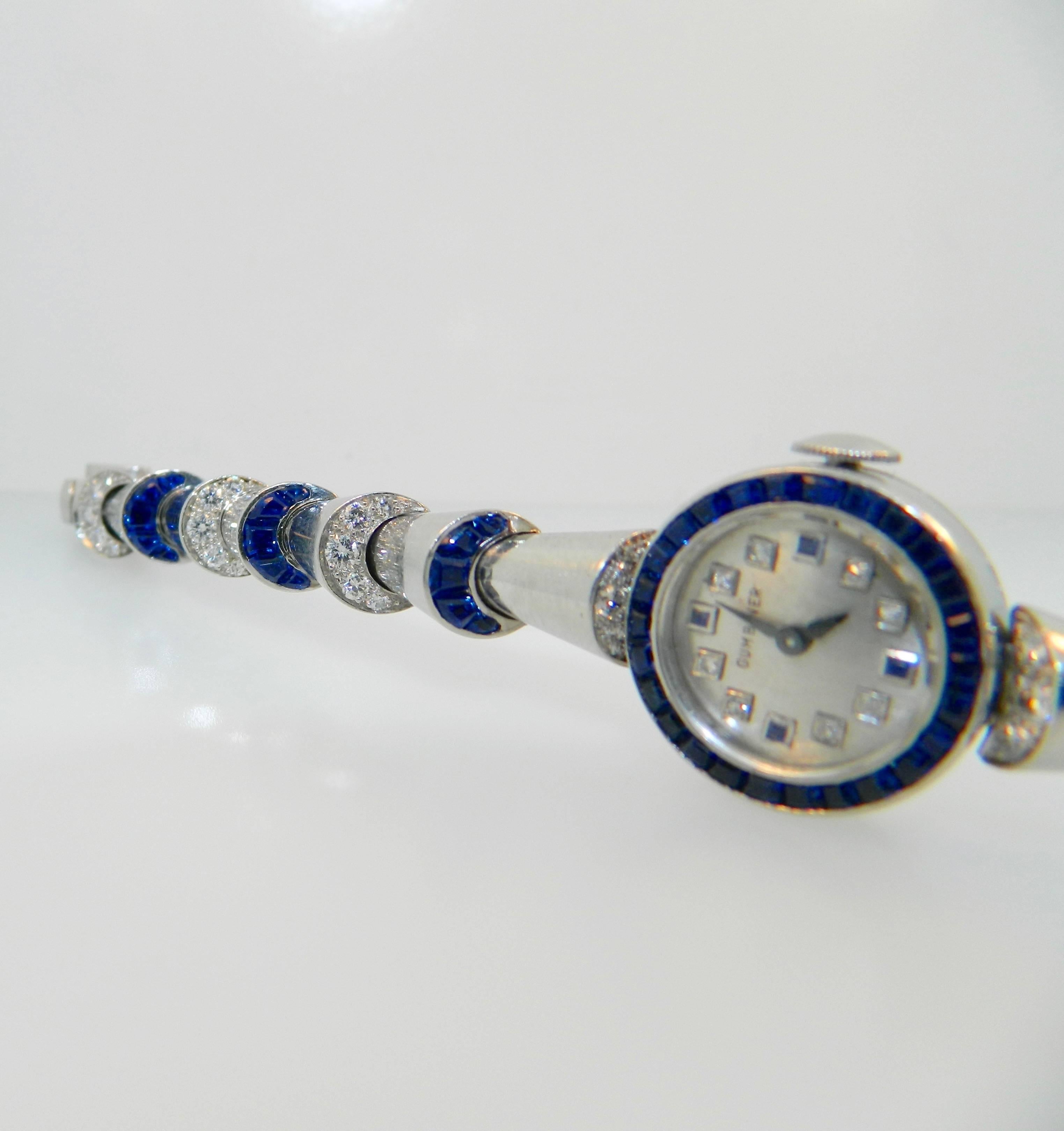 Oscar Heyman Ladies Platinum Diamond Sapphire Wristwatch In Excellent Condition For Sale In Chicago, IL