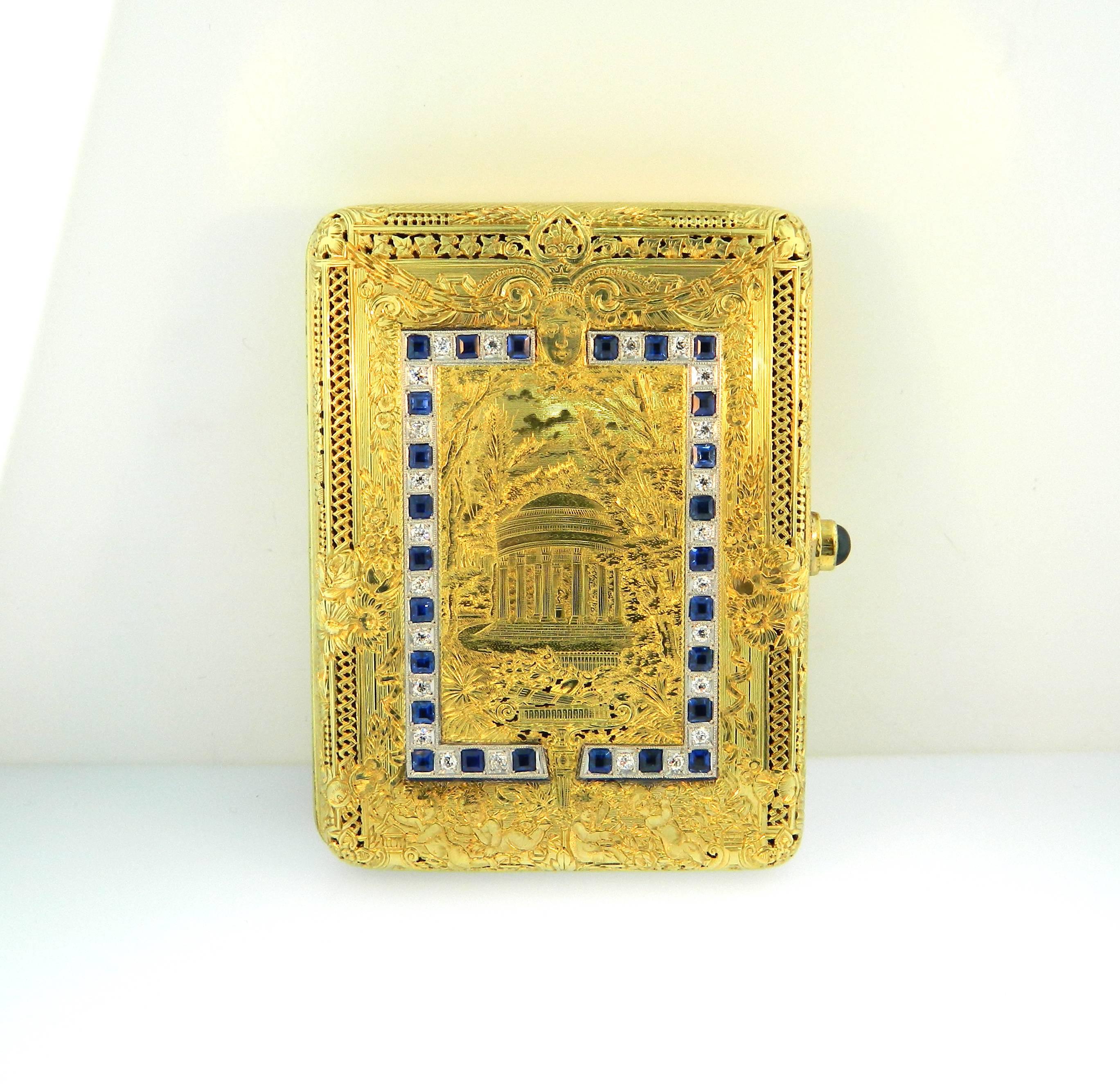 A superb 1940s 18kt gold, platinum, diamond, ruby and sapphire hand engraved powder case/compact.  This stunning object was custom made for Rita Dee Hassenfeld by Nat Koslow New York.  157 grams.  From the estate of Rita Dee Hassenfeld. 

