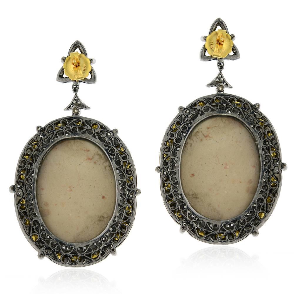 Beautiful Lady face Lava Cameo Rosecut and Pave Diamond Earrings with push and post in gold. 

18k:1.65g
D:11.12ct
Slv:28.68gm
Cameo-81.10cts
