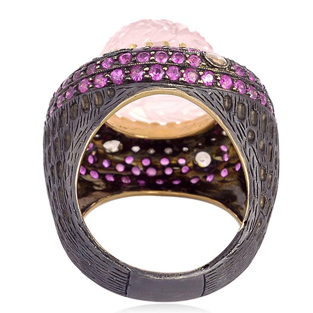 Stunning  Carved Rose Quartz Cocktail Ring with Diamonds and Ruby around with beautiful texture work all around the shank. 

Ring Size: 7 (can be sized)

14kt:2.75gms
D:0.79cts
Slv:8.33gms
Ruby:2.51cts
Rose Quartz:13.61cts