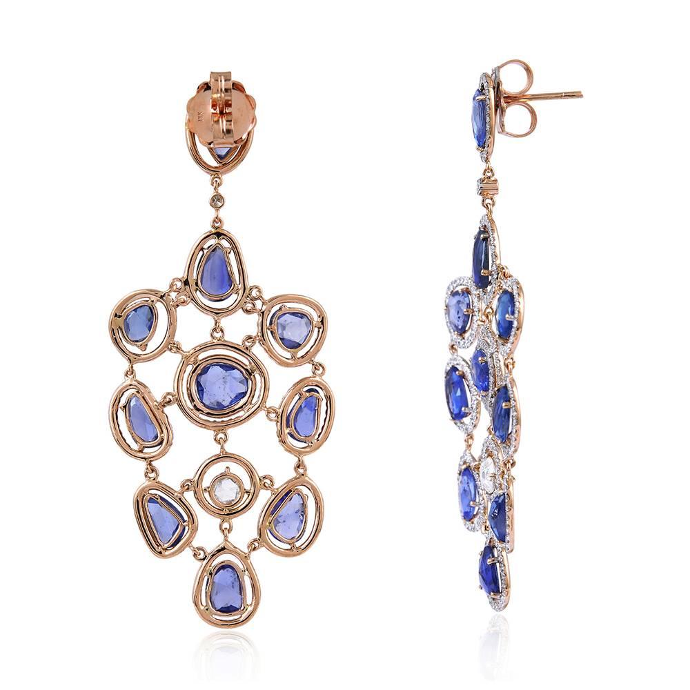 Very exquisite looking Diamond and Light Blue Sapphire Chandelier Earring is set in 18K Rose Gold. This earring has all the stones very delicately set and has a nice swaying effect in it. 

18K:11.1gms
Diamond: 3.4cts
Sapphire:13.34cts