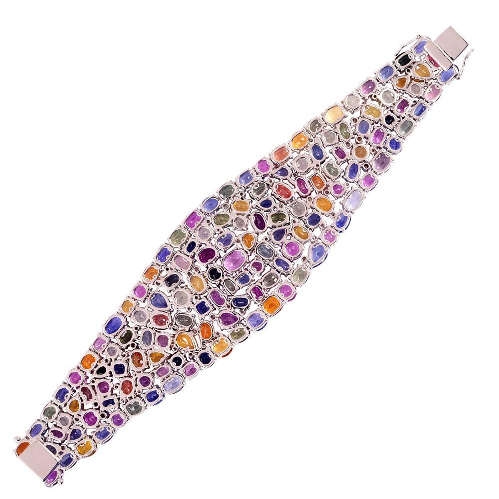 Stunning, amazing,gorgeous Multi Color Natural Sapphire and Diamond Bracelet, totally a pride possession. This bracelet is hand crafted and is one of our best piece. This has been made in 18K  White gold with hand picked brilliant natural sapphires