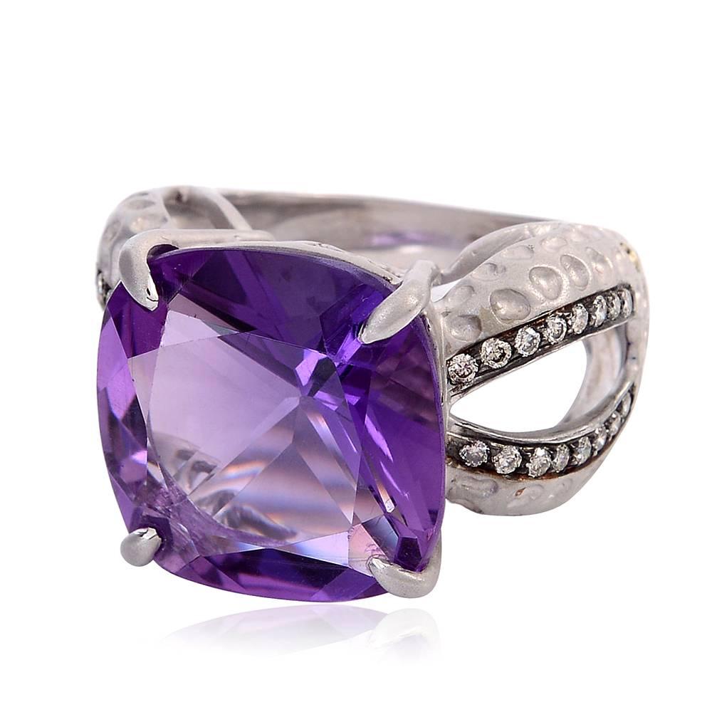 This perfectly Cushion Cut Amethyst Cocktail Ring set high with Diamonds on the shank is made in 14K white gold with texture. 

Ring Size: 8 (can be sized)

14k:8.81g
Diamond: 0.46ct
Amethyst: 17.89ct
