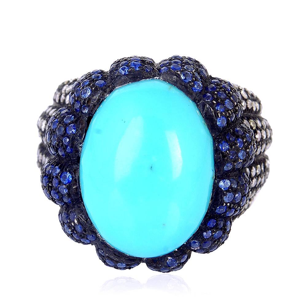 Beautiful Domed Turquoise Cocktail Ring with Sapphire and Diamond is one statement ring to own.

Ring Size: 7 ( can be sized )

14k:3.7g
Diamond: 2.18ct
Sl:13.48g
Blue Sapphire: 2.44ct
TURQUOISE: 14.55cts


