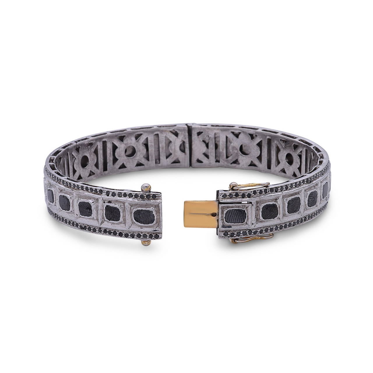 Handmade in India with 14K Gold & Silver this beautiful bangle is openable with 2 safety clasp. This bangle has slice & full cut black diamond. There is total of 7.92cts. Can be worn day to night.
