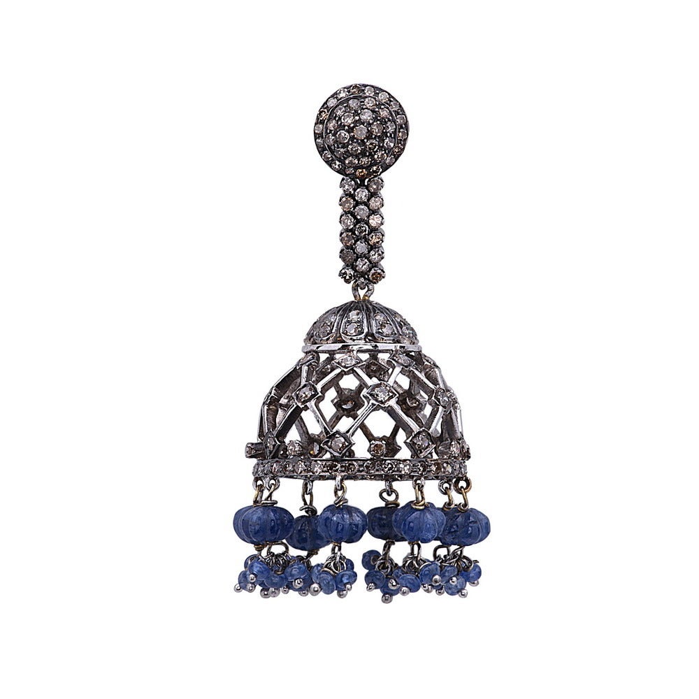 These captivating 18k black rhodium Gold Tassel Earrings with small group of Blue Sapphire. The pave ear studs and the tassel cap is beautifully hand made totaling to 5.43 cts. Wear them as your sole statement accessory for evening.