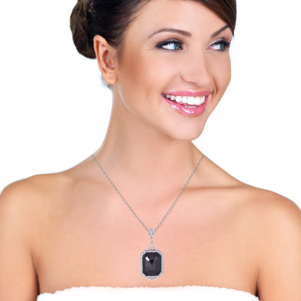 18K White Gold Stunning Black & White Diamond Pendant is super attractive. This comes with an 18 Inch long white gold chain.
18K White Gold: 5.47gms
Diamond: 28.82 cts