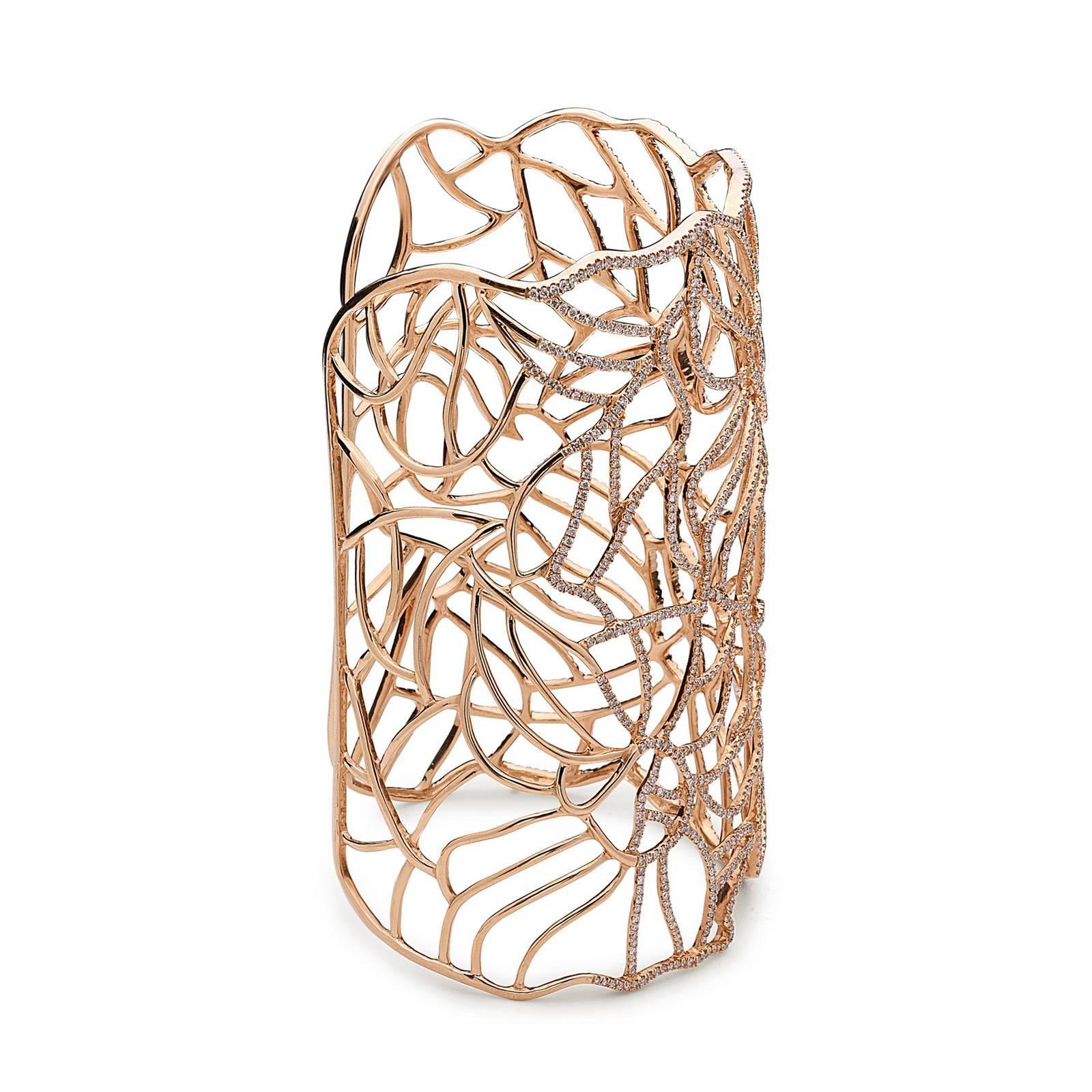 This gorgeous floral cut out Rose Gold Diamond Long Cuff is a statement cuff is for real. Wear it with any color outfit be the star of the party. The cuff is open from back side to easily slide on. Length of cuff: 3.75 inches, broadness of cuff
