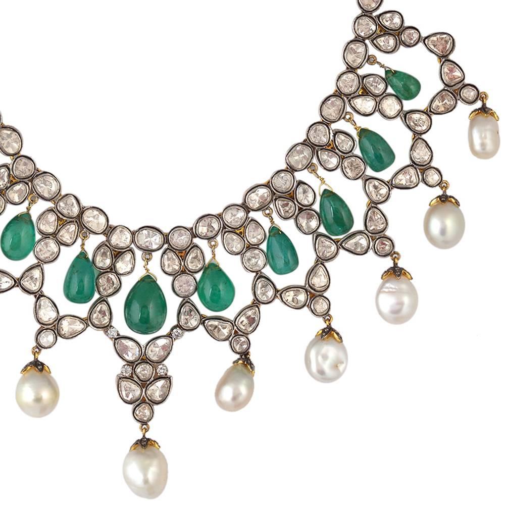 This magnificent timeless piece of jewelry is handcrafted by our finest craftsmen with hand assorted Rosecut Diamond, Emerald & Pearls. Wear it to your most important event of your life. It has a lobster clasp closing at back.