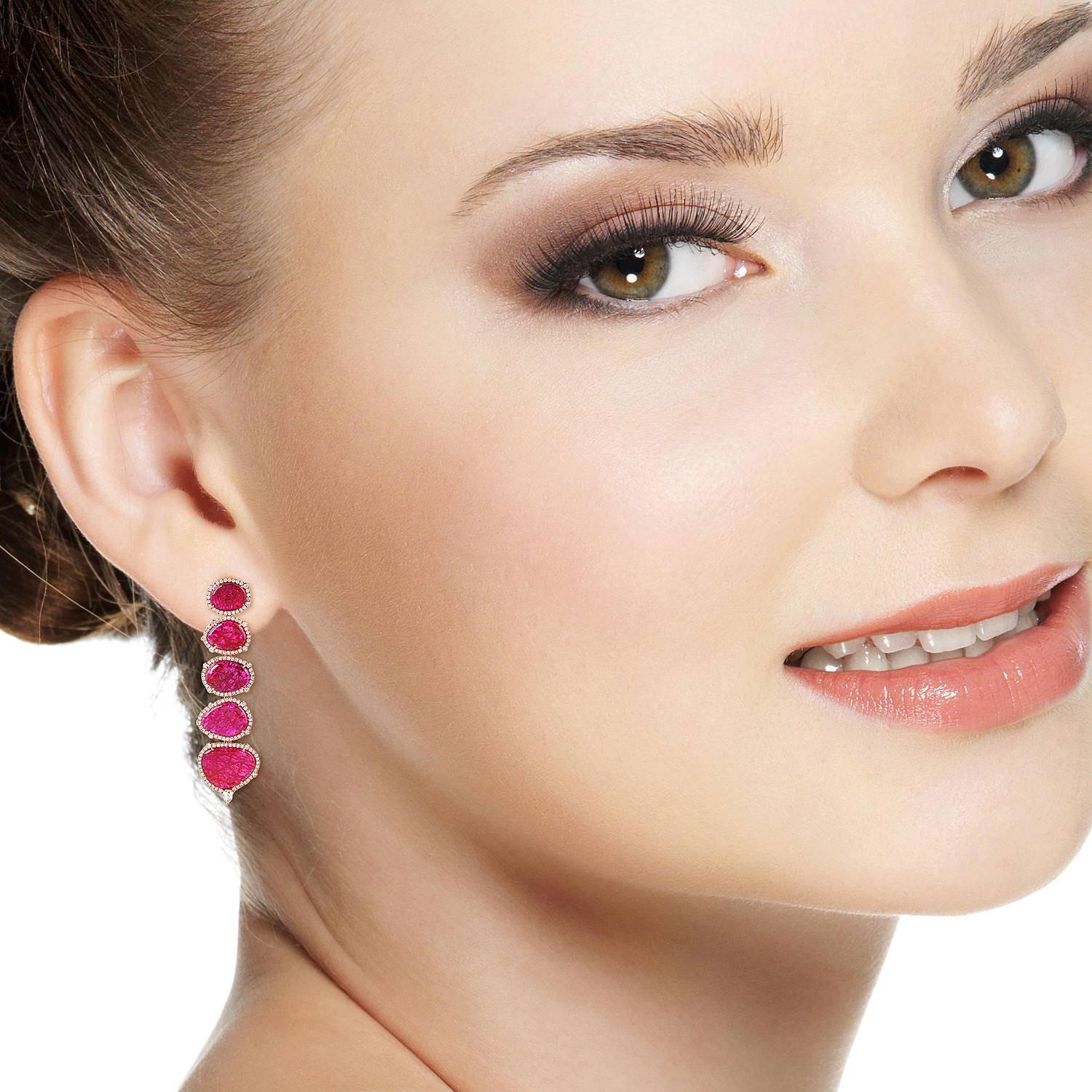 Modern Sleek Enhanced Ruby & Diamond 18K Rose Gold Earring is beautifully handcrafted from front to back. This earring has sliced treated  rubies and pave diamonds around. This earring has push and post closure.