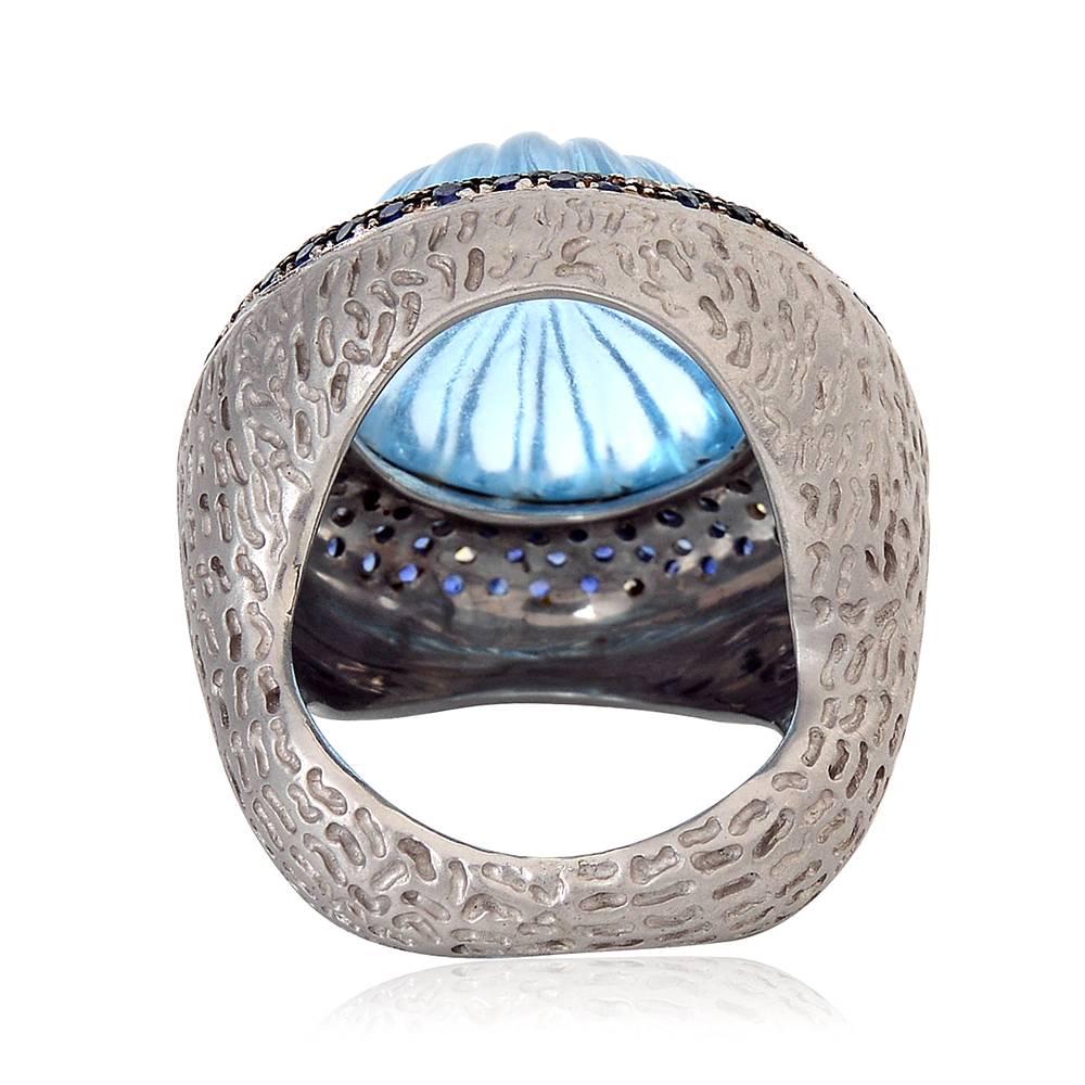 Stunning Cocktail Blue Topaz Ring with Diamonds and Blue Sapphire set in 14K white gold and with beautiful texture around the shank, wear this to any party to get all the attention. 

Ring Size: 7.75 ( can be sized)

14k:16.53g
Diamond:
