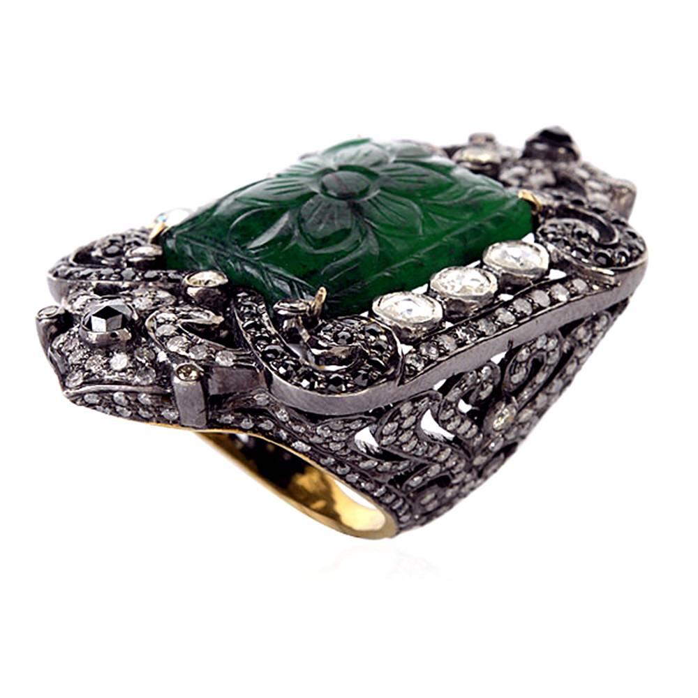 Spectacular a showstopper ring always .. This carved rectangle shape carved emerald ring with pave and rosecut diamonds around is a truly designer piece.


Ring Size: 7 (can be sized)
18kt:1.75g
Diamond: 5.8cts
Silver: 17.18g
Emerald:18.36cts

