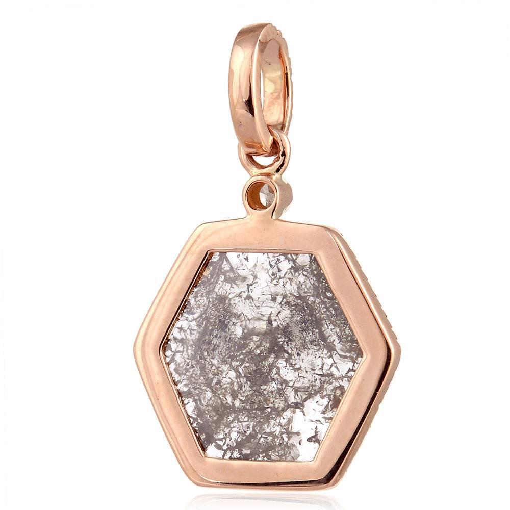 Hexagon Slice and Pave Diamond Pendants  with pave diamonds around and a cute bayle on top. This pendant dose not come with chain.

18kt: 2.3gms
Diamond: 2.3cts
