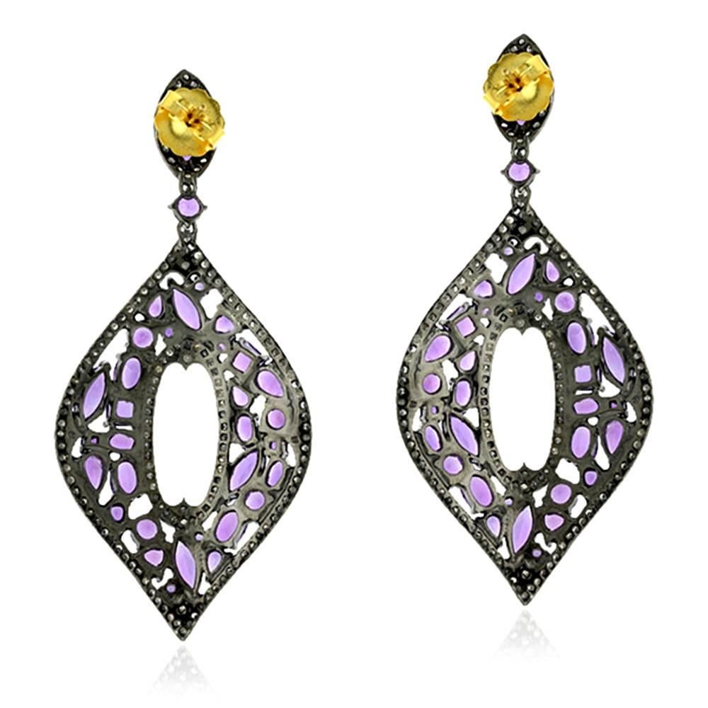 This earring is very unique and pretty with different shapes of Amethyst set in a pretty leaf shape with pave diamonds around. 
Closure: Push Post

18k: 1.37g
Diamond: 2.37ct
Amethyst: 17.05cts