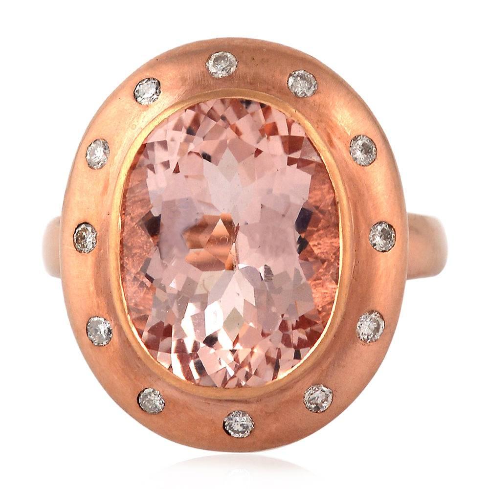 Oval shape bold but delicate looking this Morganite and Diamond Ring in 18 Rose Gold is impeccable.

Ring Size: 7 ( can be sized )

18KT Gold:7.918gms
Diamond: 0.220ct
MORGANITE:6.190ct

