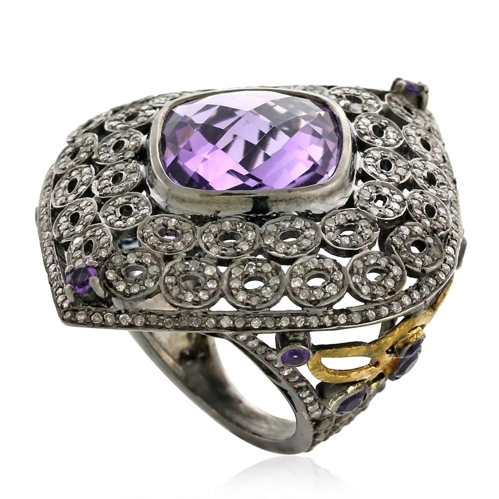 Attractive and a real cocktail ring with checkered Amethyst in center with pave bubbles all around.

Ring Size: 7.25 ( Can be sized ) 

18k:1.35g
Diamond: 1.3ct
Slv:11.49gm
Amethyst:10.35ct