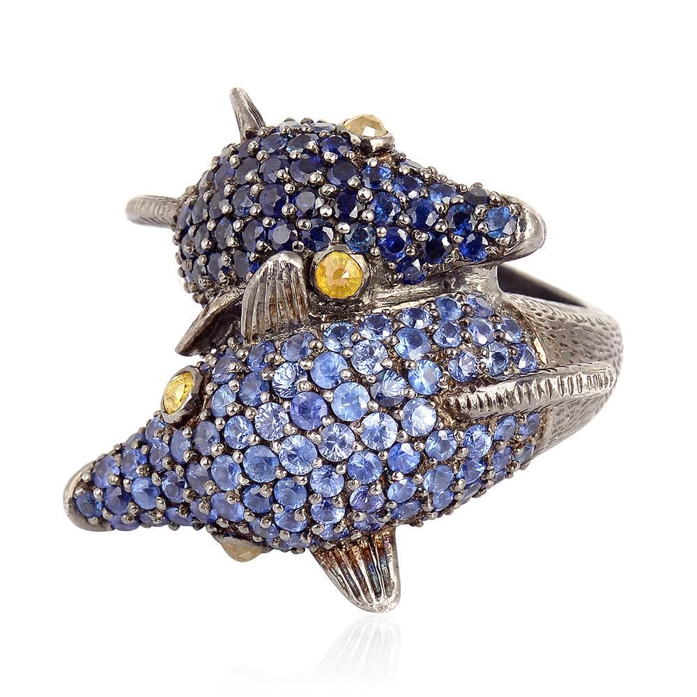 Playful and pretty looking this all pave Blue Sapphire Dolphin Ring with Ice Diamond in eyes.

Ring Size: 9 (can be sized)

Diamond: 0.56cts
Slv: 26.84gms
Blue Sapphire: 7.00cts,