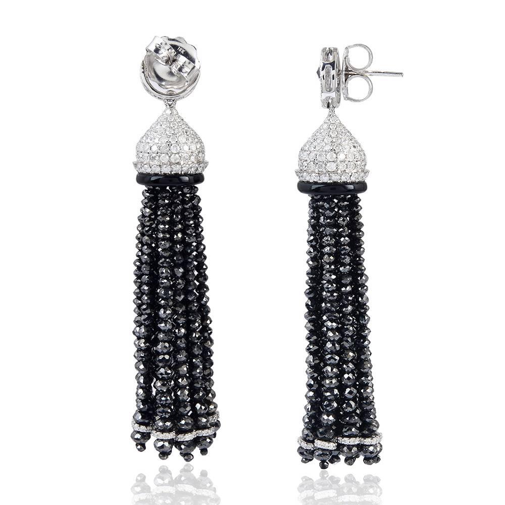 This beautiful Black and White Diamond Tassel Earrings in 18K White Gold is a pure mystique piece. 

18K:11.87G
Diamond:57.2CT,
ONYX:2.3CT