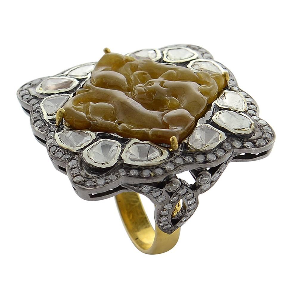 Diamond Shape brown carved Jade Ring with rosecut diamond around is a must have cocktail ring.

Ring Size: 7 ( can be sized )

18k: 3.15g
Diamond: 3.94ct
Silver: 9.61gm
Jade: 8.85ct
