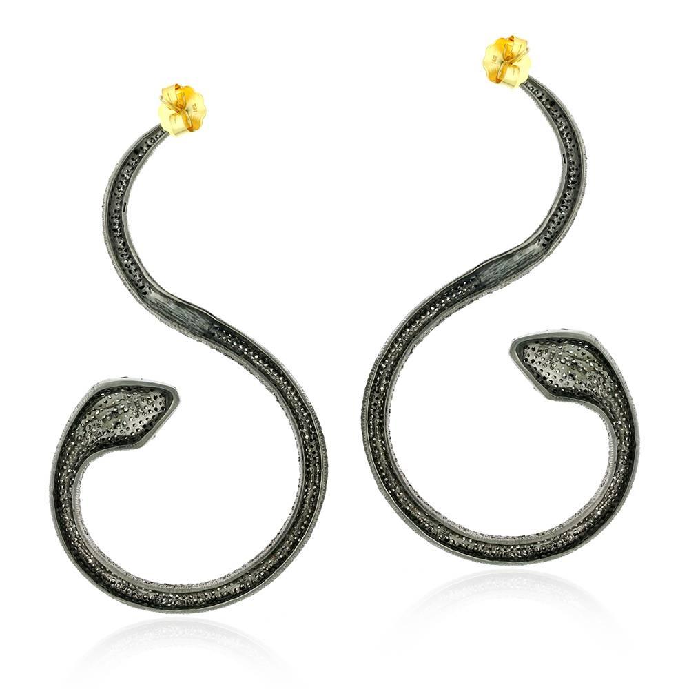 This long sleek Pave Diamond Snake Earring is flawlessly stunning. 

Closure: Push Post

14k: 1.7gms
Diamond: 11.32ct
Slv: 26.86gms 