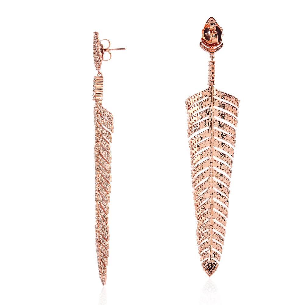 Luxurious looking long and beautiful Diamond Feather Earring set in 18K Rose Gold. This earring is stunning and make you the show stopper for any gathering. 

18k: 34.92cts
Diamond: 10.06Ct
