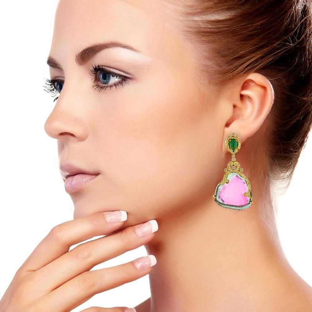 This ravishing 18K Yellow Gold Watermelon Sliced Tourmaline Earring with diamonds and emerald is handcrafted designed with gold with pave diamonds. 
Diamond: 1.02cts
Earring closure: Push Post
