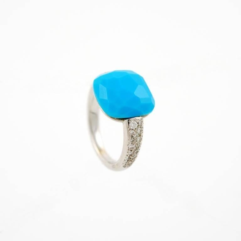 18kt white gold ring, featuring 0.26ct of diamonds and faceted cushion cut turquoise . The ring is part of the collection "Capri" by Pomellato 2000's ( retailer price is $ 4350).
Ring size 5 1/4