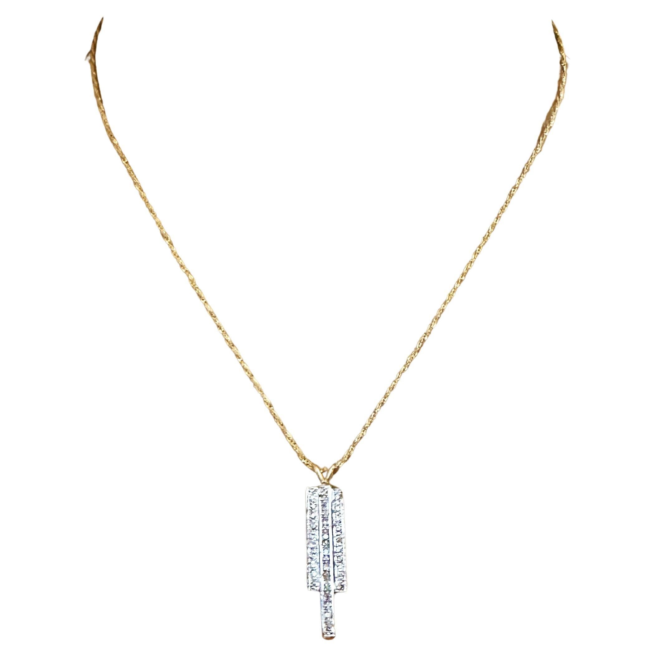 I just love this necklace!  The design is just so cool.  It has 35 brilliant cut diamonds measuring  2.0 x 2.0 x 1.4 mm.  The Clarity is SI1 and the Color is H.  They total 1.25 carats.  The necklace is 16 inches long. It's stamped 