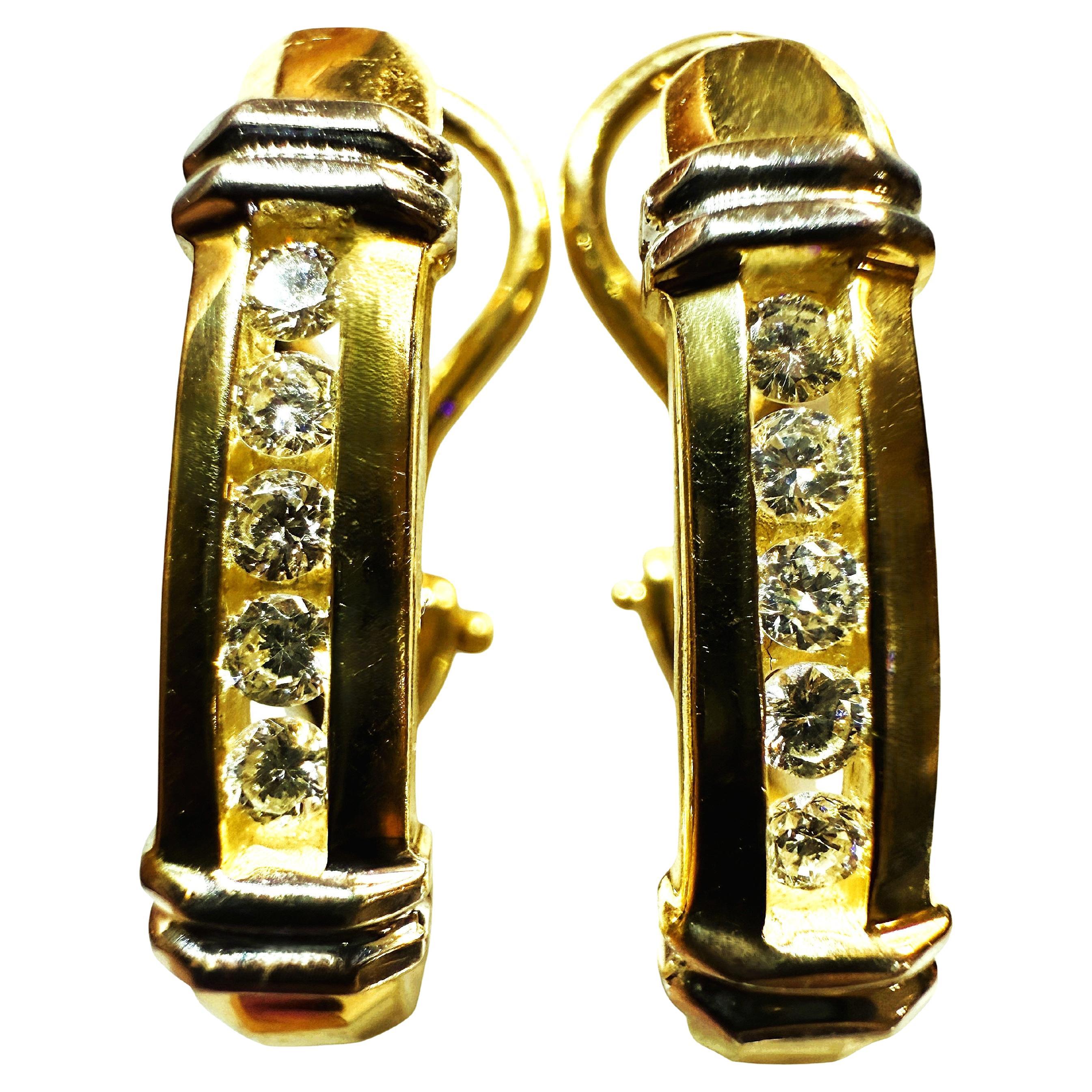 Boucles d'oreilles en or jaune et blanc 14k avec diamants .30 carats Omega
