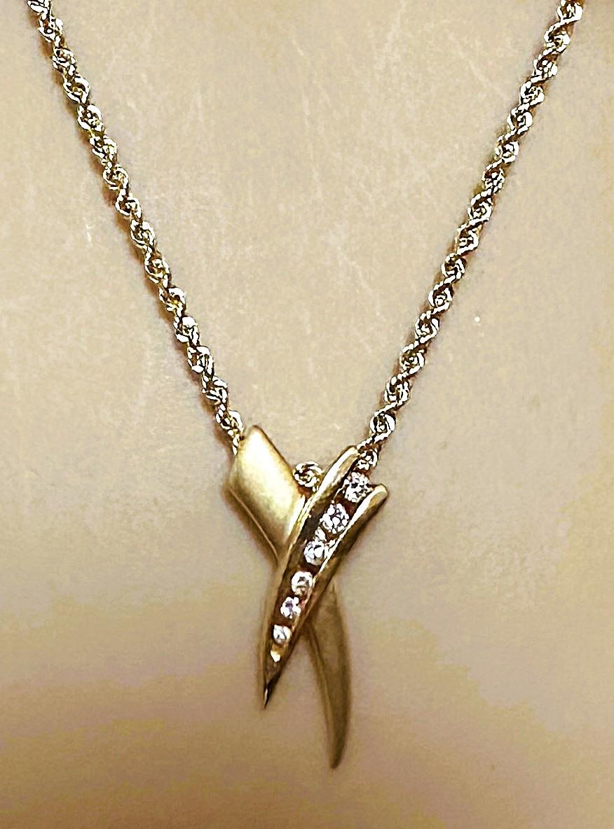 Ciondolo d'amore a scorrimento con diamante in oro giallo 14k da 0,16 carati e catena in oro 14k da 18