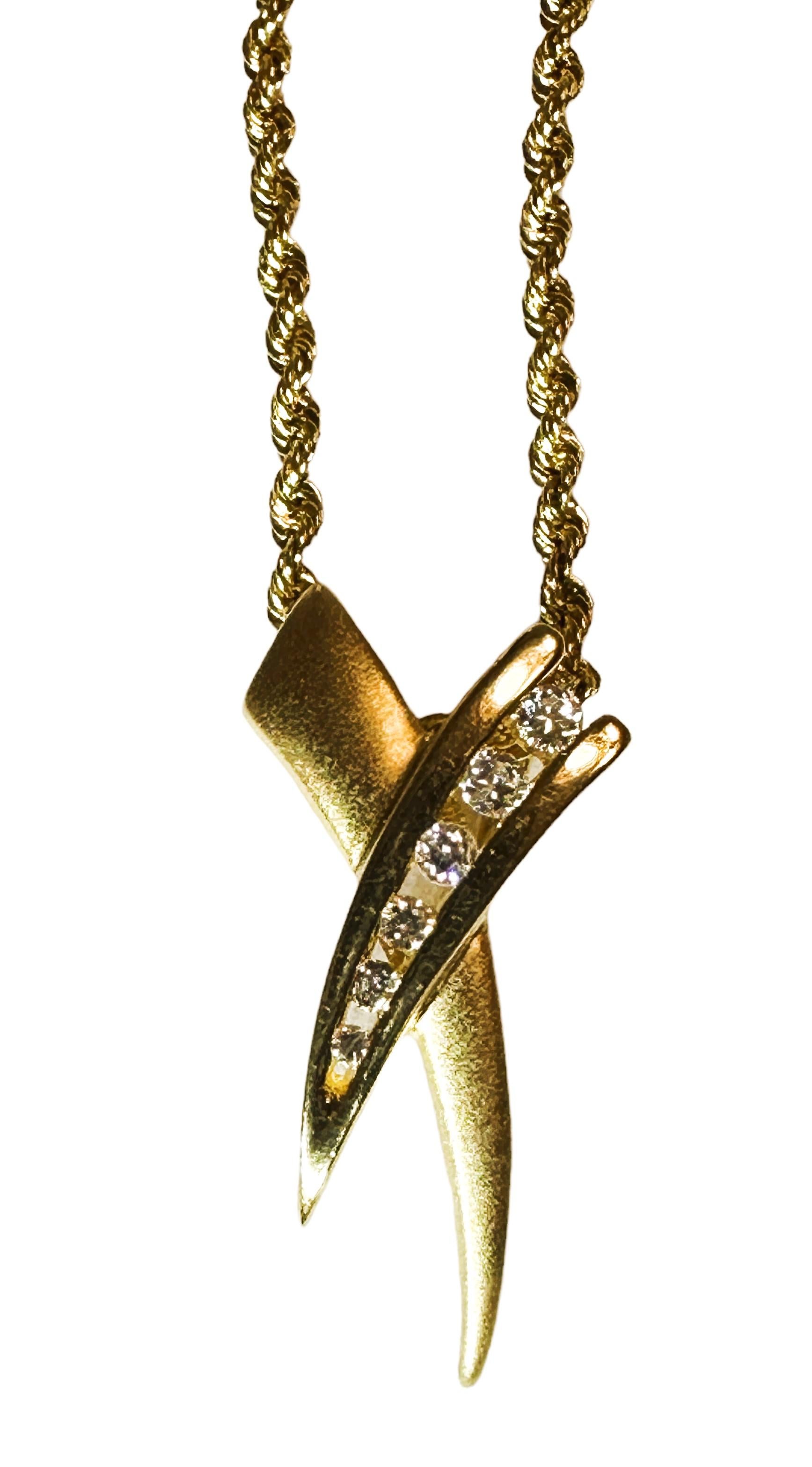 Ciondolo d'amore a scorrimento con diamante in oro giallo 14k da 0,16 carati e catena in oro 14k da 18