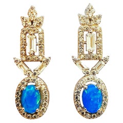Nuovi orecchini in argento da 0,86 carati con opale blu, diamanti e zaffiri taglio Baguette