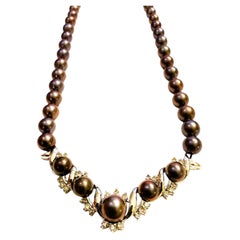 Collana a filo singolo con perle di Tahiti annodata a mano in oro bianco 14 carati