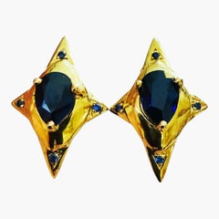 Neuer, mit 24-karätigem Gelbgold vergoldeter Ohrring aus Sterlingsilber in Sternform mit einem blauen Saphir von 4,25 Karat