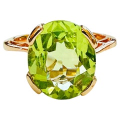 Nuovo anello in argento sterling placcato oro rosa con peridoto da 4,60 carati e zaffiro