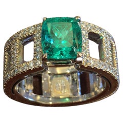 18kt White Gold Ring, 1.50ct Diamonds, 2.33ct Emeralds Cocktail Ring