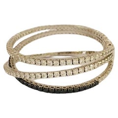 18kt white gold 37.00ct twisted wire bracelet, White & Black Diamonds 8.29ct