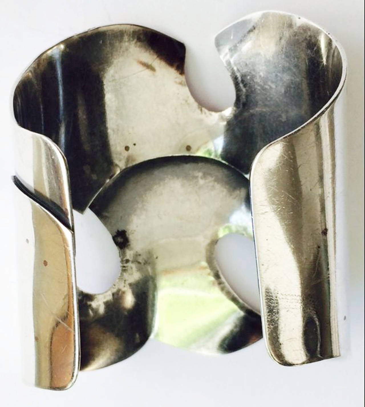 A fine and rare Art Smith modernist cuff bracelet. Rare signed sterling silver item features excellent design and construction execution. Open back cuff slides easily on wrist. Original patina intact. A extremely rare and important item appropriate