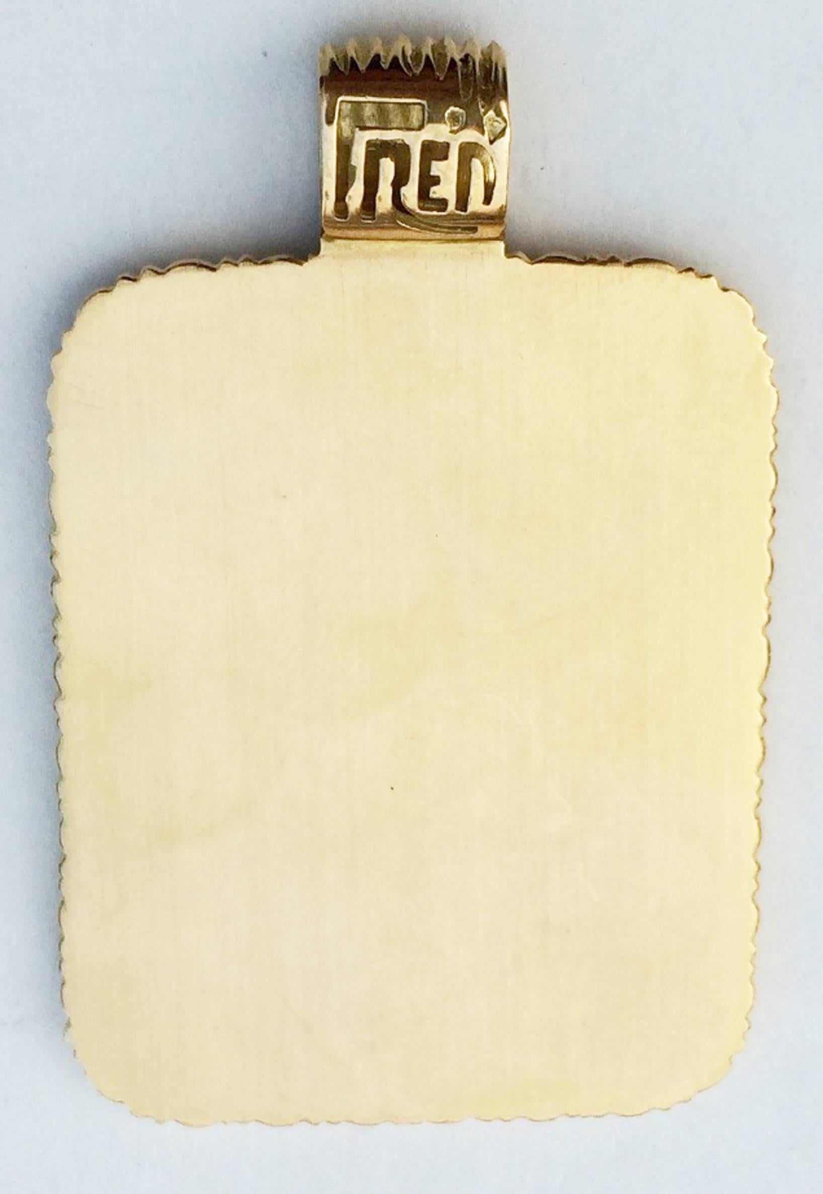 A fine Fred Paris gold astrological pendant. Signed sculpted yellow gold item depicts the Capricorn ram. Outstanding design and execution. Excellent.