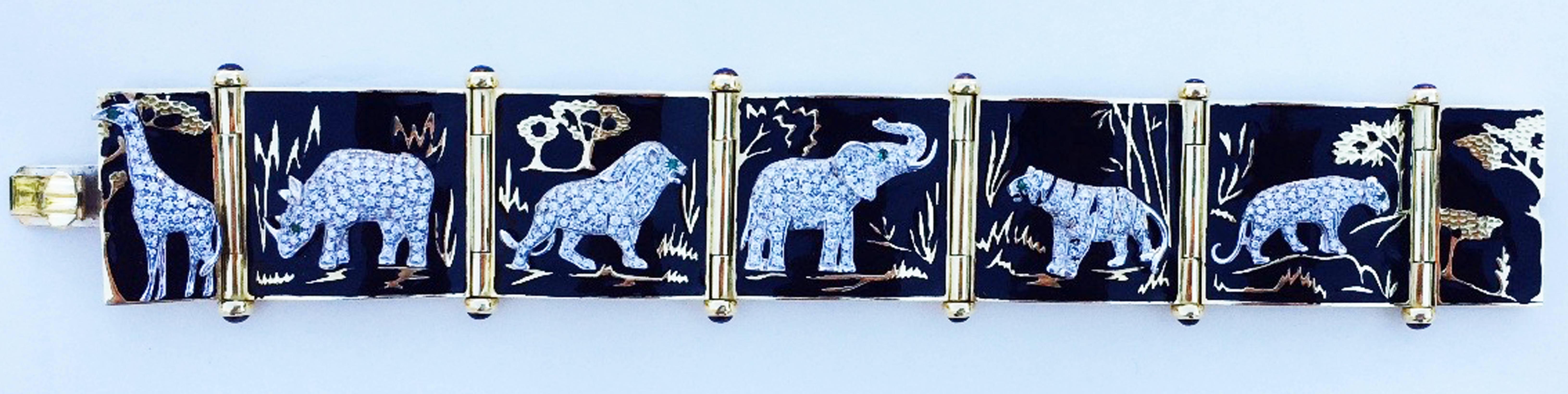 A exquisite Robert Legnazzi Safari wildlife theme cuff bracelet. Signed and hallmarked Italian yellow gold item features six segmented black enamel links. Each link features a pave diamond (approx. 3ctw) covered African wildlife example. Each animal