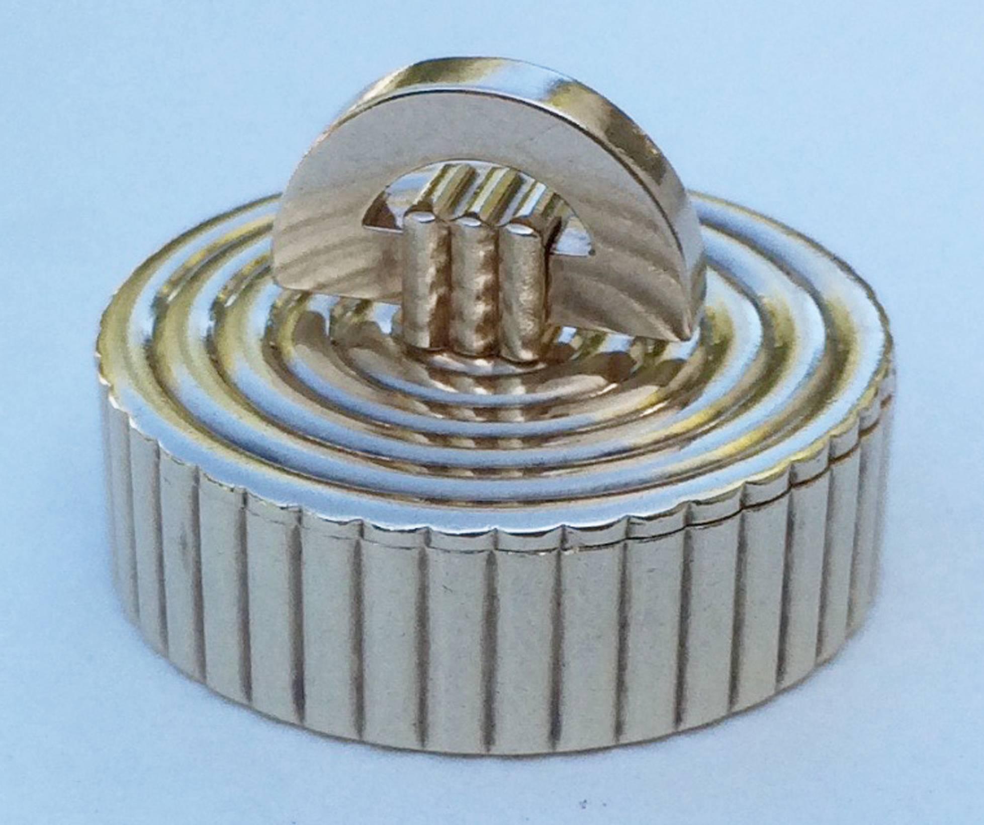 A fine Cartier London rose gold pill/snuff box. Signed item retains original Cartier gilt leather fitted box. Machine turned item features a fold-over finial and tightly fitted case. Item hallmarked for London and Elizabeth coronation, 1953.